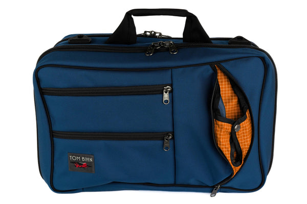 A Western Flyer in Navy (blue) 1050 Ballistic with an Zest (orange with white grid) 200 Halcyon interior.